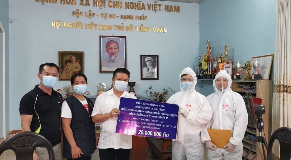 Doanh nghiệp hỗ trợ cộng đồng người Việt tại Lào chống dịch Covid-19