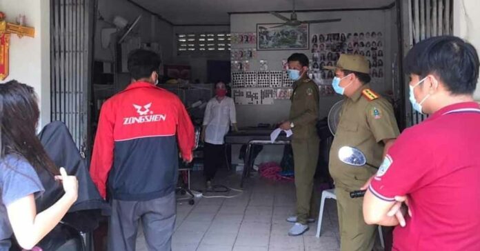 Quán làm đẹp ở Vientiane bị phạt vì cố ý vi phạm lệnh phòng dịch
