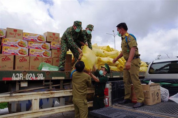 Tang luong thuc, vat tu y te cho luc luong bao ve bien gioi Lao hinh anh 2