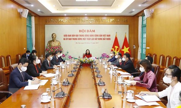 Viet Nam-Lao trao doi ve cong tac dan van cua moi Dang hinh anh 1