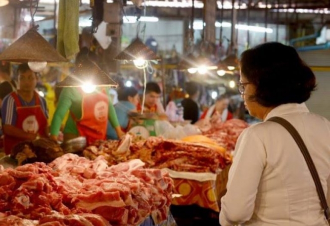 Thủ đô Viêng Chăn không để thịt lợn tăng giá trong thời điểm tết Bun Pimay