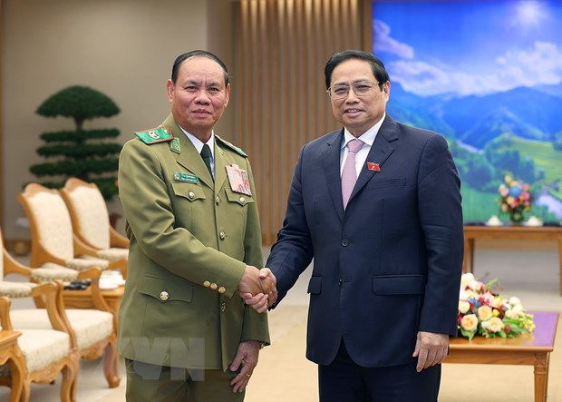 Thu tuong Pham Minh Chinh tiep Pho Thu tuong, Bo truong Cong an Lao hinh anh 1