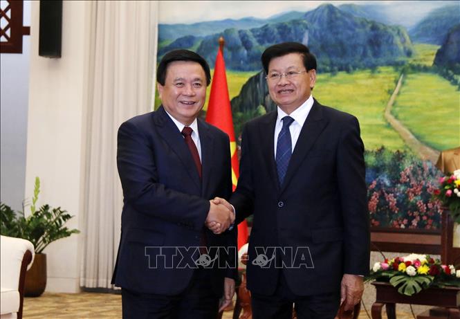 Tăng cường trao đổi thông tin, nghiên cứu về lý luận và thực tiễn giữa Việt Nam và Lào