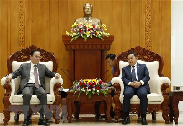 Thuc day hop tac giua hai Ban Doi ngoai Trung uong Viet Nam va Lao hinh anh 3