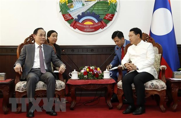 Thuc day hop tac giua hai Ban Doi ngoai Trung uong Viet Nam va Lao hinh anh 2