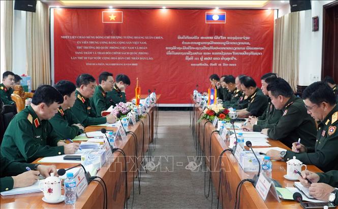 Việt Nam và Lào trao đổi chính sách quốc phòng