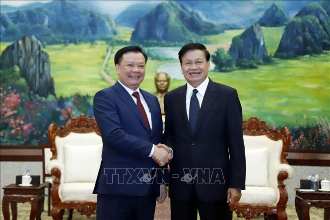 Tổng Bí thư, Chủ tịch nước Lào đánh giá cao kết quả hợp tác giữa Hà Nội và Viêng Chăn