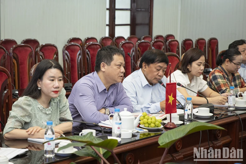 Đoàn cán bộ quản lý báo chí Lào thăm và làm việc tại Báo Nhân Dân ảnh 3