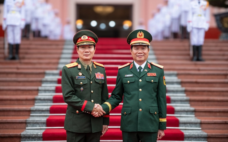 Lào chọn Việt Nam là nước đầu tiên để nghiên cứu xây dựng lực lượng gìn giữ hòa bình Liên hợp quốc - Ảnh 2.