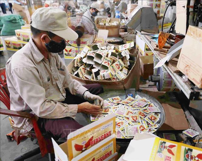 Việt Nam ban hành Kế hoạch thực hiện Hiệp định Thương mại với Lào