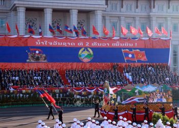Kỷ niệm trọng thể 50 năm Quốc khánh nước Cộng hòa Dân chủ Nhân dân Lào