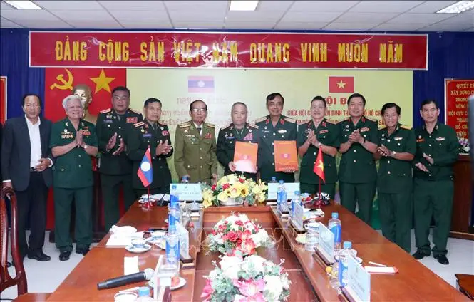 Chia sẻ kinh nghiệm công tác Hội Cựu chiến binh các địa phương của Việt Nam và Lào